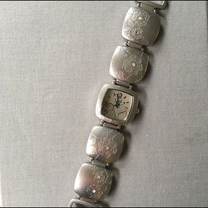 Silver engraved fossil watch